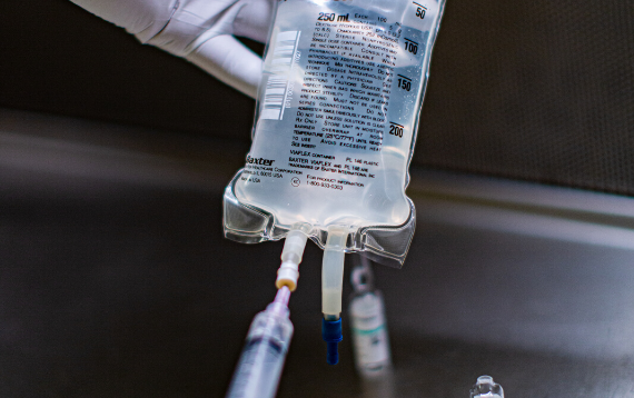 A hospital pharmacist prepared an IV medication by injecting drug into IV bag